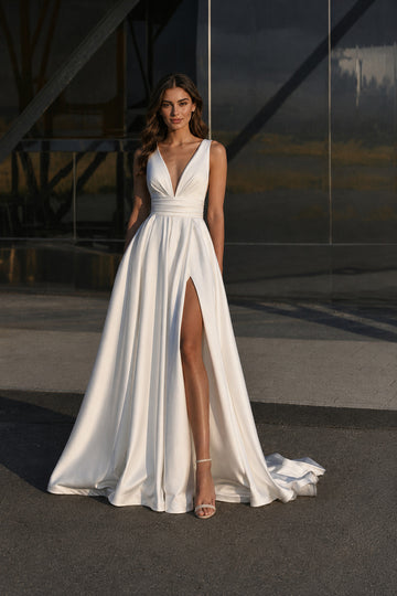 White deep V-neck waistband A-line evening gown front view