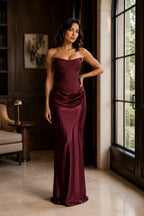 Burgundy strapless draped column evening gown front view