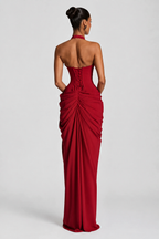 Crimson red ruched halter evening gown back view with lace-up open-back detail
