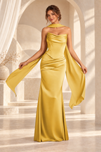 Front view of the gold strapless draped floor-length evening gown