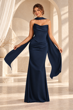 Front view of the navy strapless draped floor-length evening gown