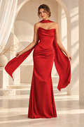 Front view of the red strapless draped floor-length evening gown