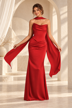 Front view of the red strapless draped floor-length evening gown