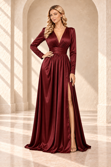 Burgundy V-neck long-sleeve evening gown with a ruched waist and flowing A-line skirt, front view.