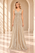 Front view of a champagne sequin evening gown with a crossover V-neck, ruched waist, and floor-length A-line skirt.