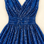 Garment-only detail of the royal blue MX340 gown showing the ruched waistband and gathered skirt.