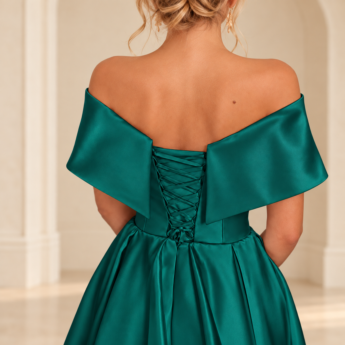 Peacock green off-shoulder dress back detail showing the lace-up panel, folded shoulder panels and waist seam