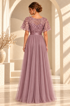 Back view of the embroidered flutter-sleeve A-line evening gown in Dusty Rose