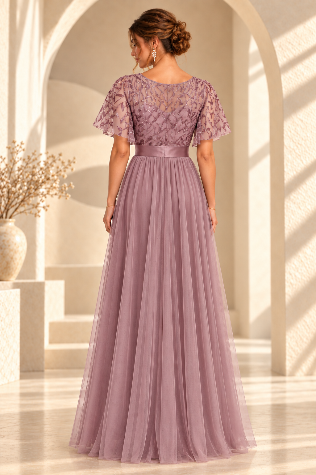 Back view of the embroidered flutter-sleeve A-line evening gown in Dusty Rose