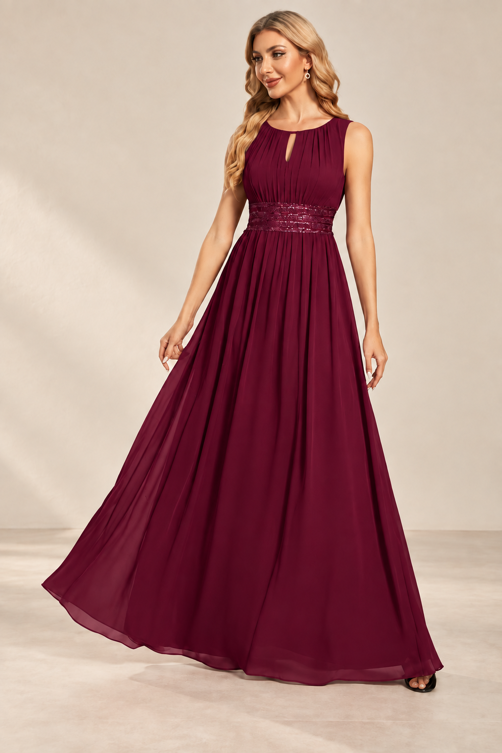 Model wearing the burgundy keyhole neck pleated A-line evening gown, front view.