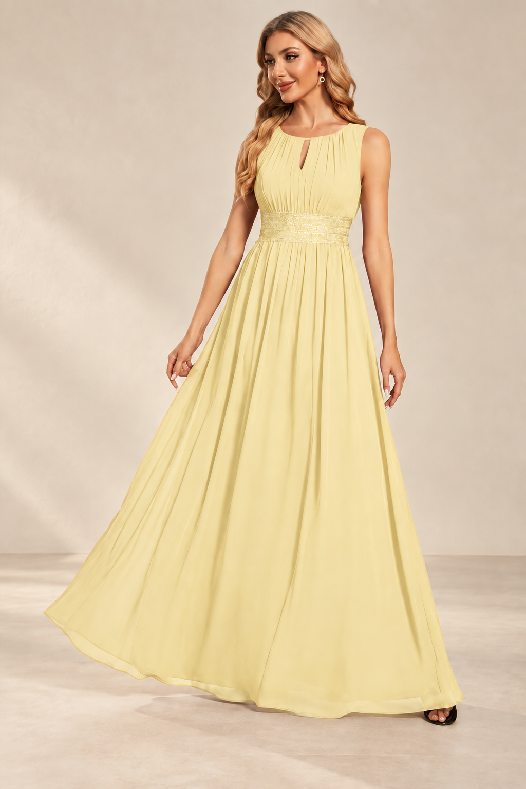Model wearing the yellow keyhole neck pleated A-line evening gown, front view.