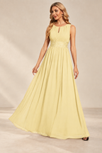 Model wearing the yellow keyhole neck pleated A-line evening gown, front view.