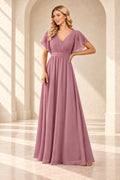 Dusty rose A-line evening gown with a pleated crossover V-neck, flutter sleeves and a floor-length skirt.